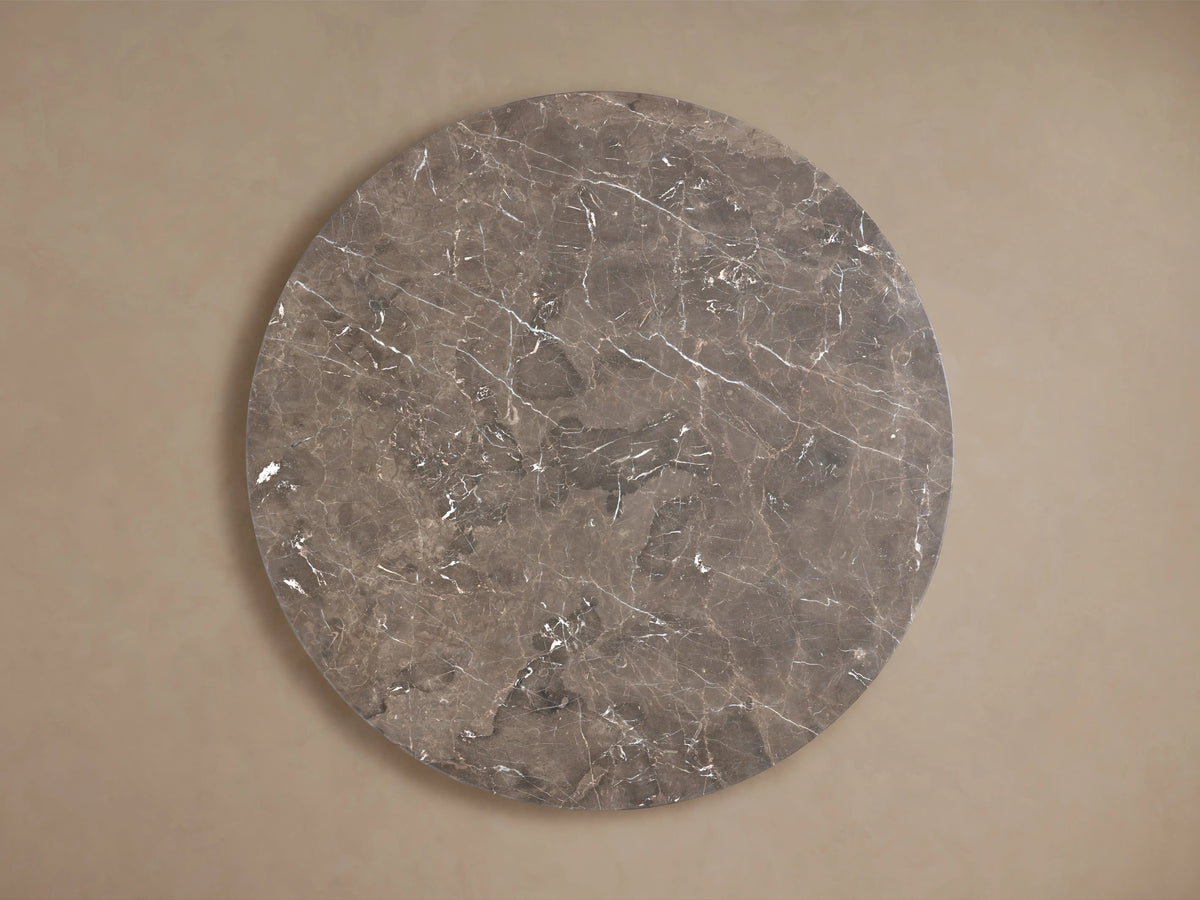 Round tabletop of the Saint Germain Dining Table in espresso brown stone, showcasing unique veining and natural mineral patterns.