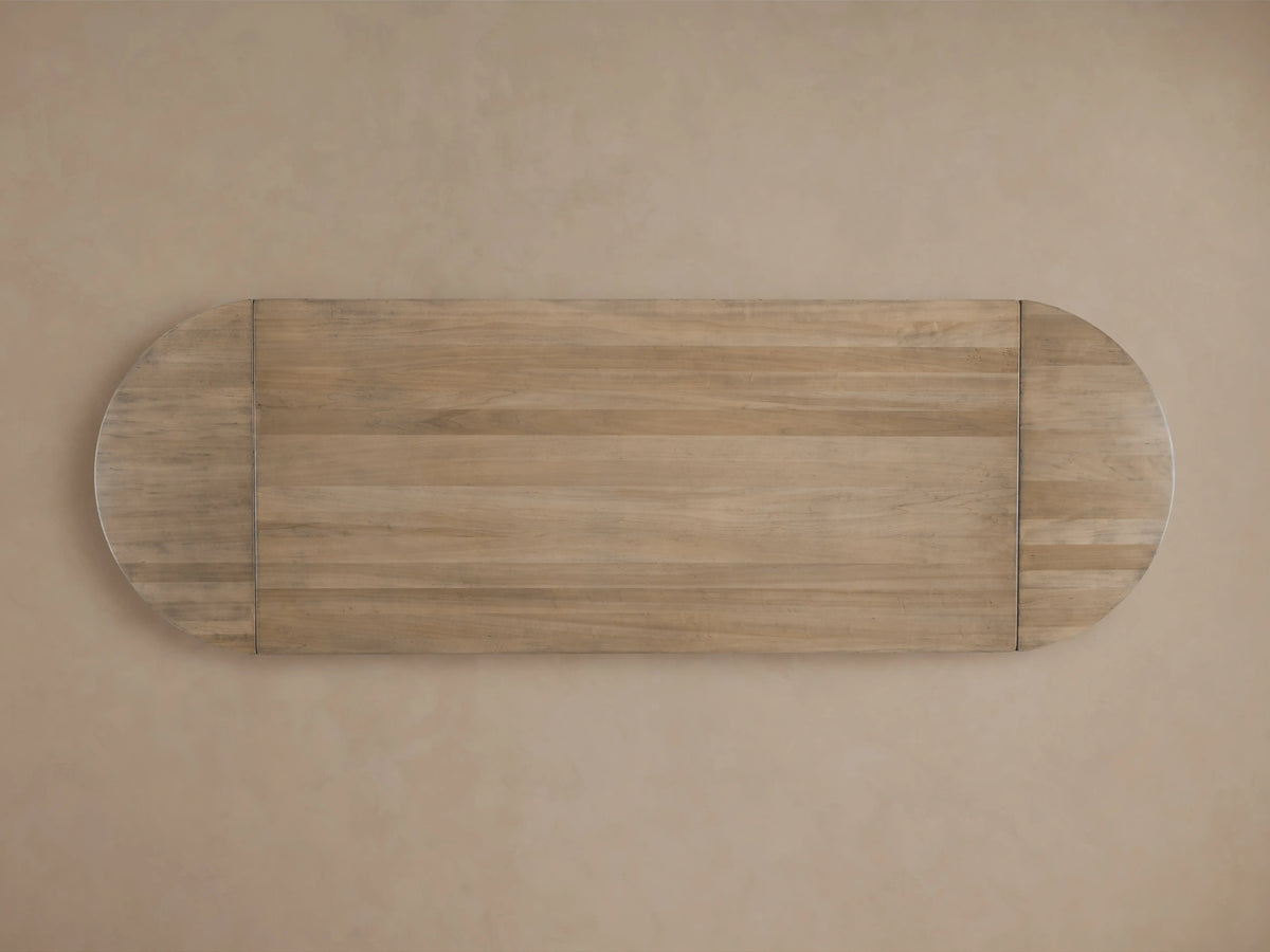 Tuscany Oval Extension Dining Table, showing a solid poplar wood tabletop with a warm, rich finish and fine grain texture.