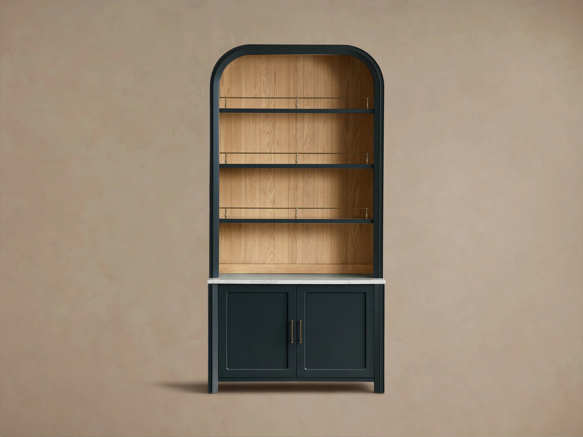 Detail view of the Eclipse Gatlin Hutch with white honed Carrara marble workspace, natural wood backing, and brass accents.