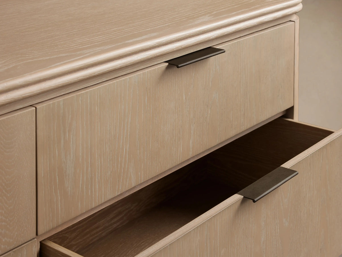 Front view of the Sand oak veneer Caden Wood Six-Drawer Dresser with six drawers, rounded edges, and pewter hardware.