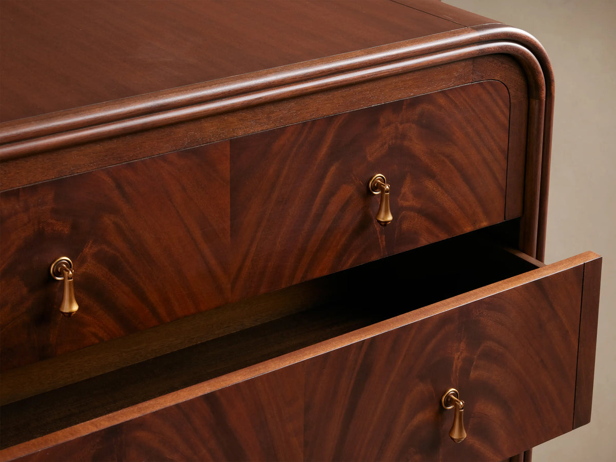 Frances Five-Drawer Dresser: Dark mahogany wood dresser with rounded top, 5 drawers featuring book-matched veneer & brass knobs.