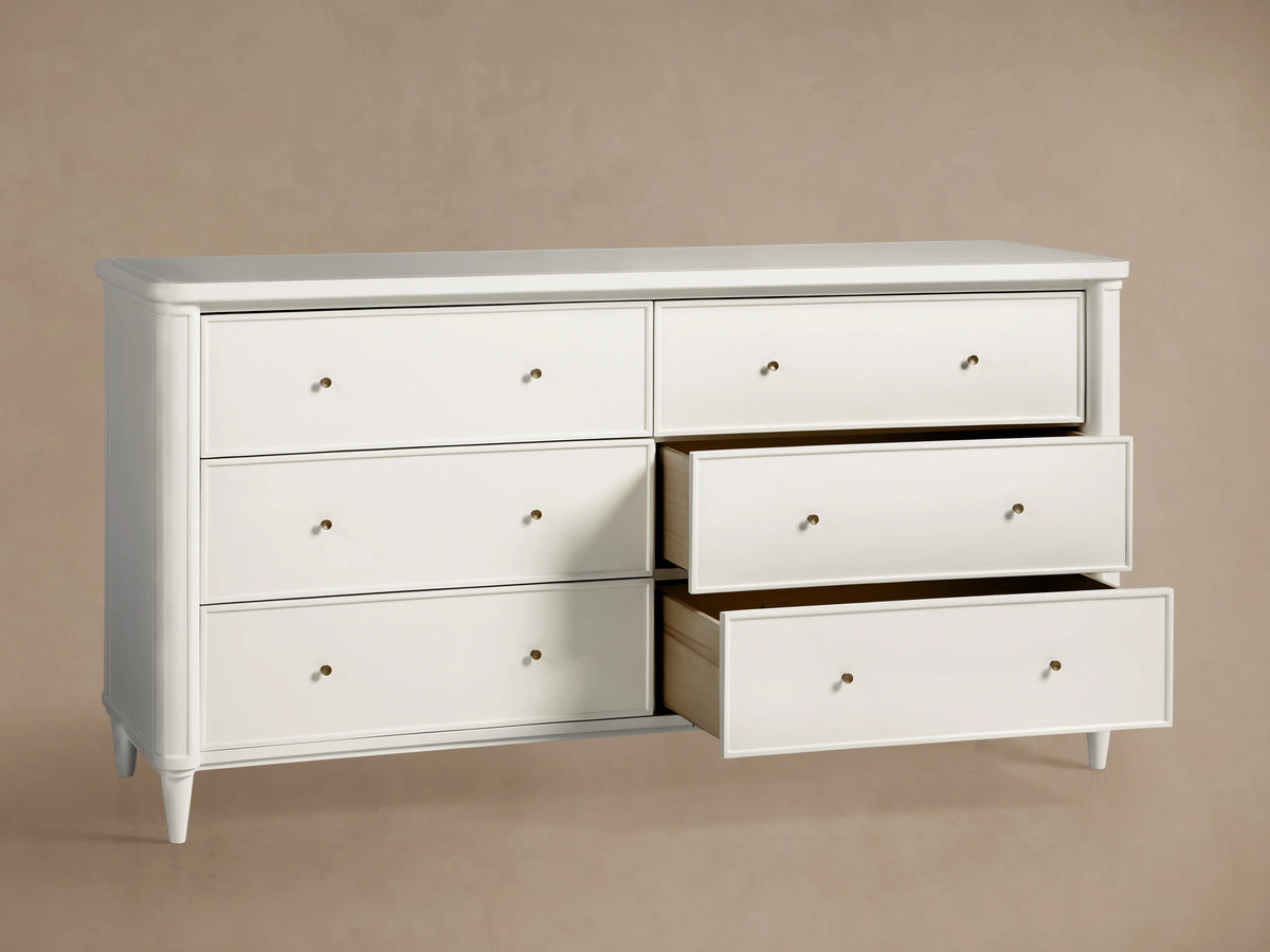 Open drawer of the Henley Wide Six-Drawer Dresser showing solid beech wood, dovetail joinery, and brass pull handle.
