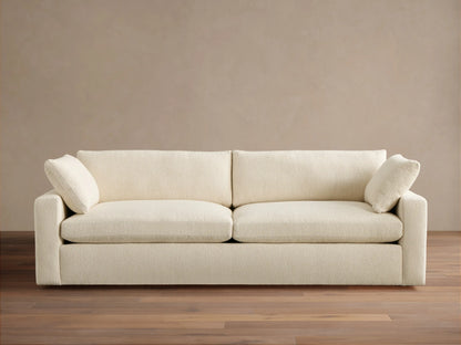 Beale Sofa, off-white textured fabric, front view. Two large seat cushions, two back cushions, and two small arm pillows.