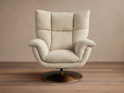 Deacon Swivel Recliner in beige fabric, with high cushioned backrest, curved armrests, and a bronze swivel base on wooden floor.