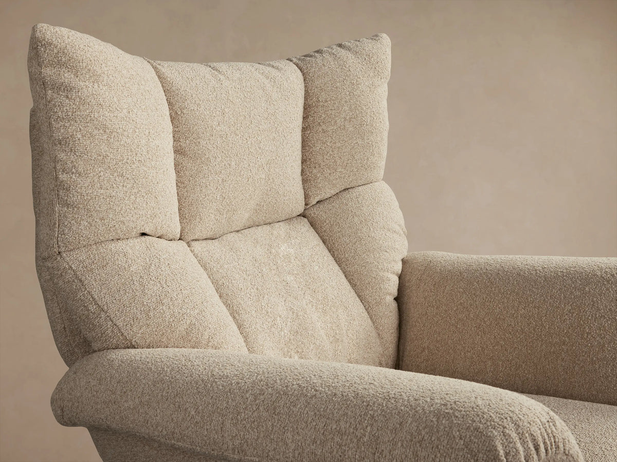 Deacon Swivel Recliner in beige fabric, showcasing armrest, seat, and visible side lever against a neutral background.