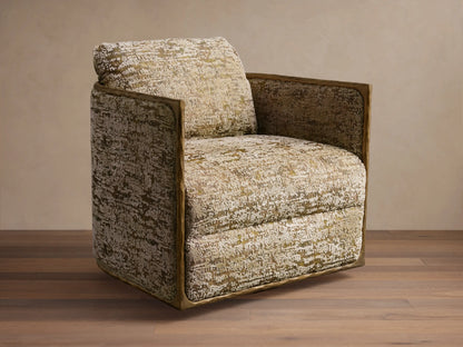 Front view of the Nataly Swivel Chair with cream and olive textured upholstery and an exposed light brass frame.