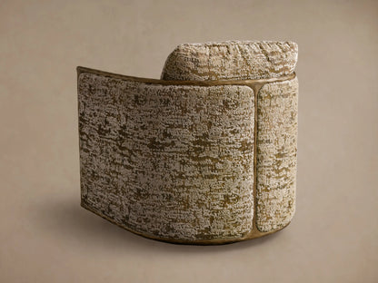 Close-up of the Nataly Swivel Chair, showing its textured olive green and cream fabric with hammered light brass trim.