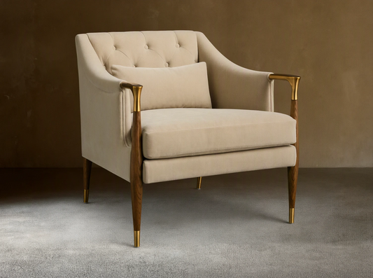 Front view of cream Fisher Club Chair with tufted back, dark wood arms and legs with brass accents, includes matching lumbar pillow.