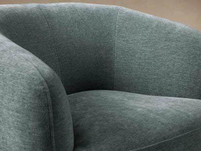 Cerrito Swivel Chair, upholstered in textured teal fabric with a rounded, contemporary design, on a light wooden circular swivel base.