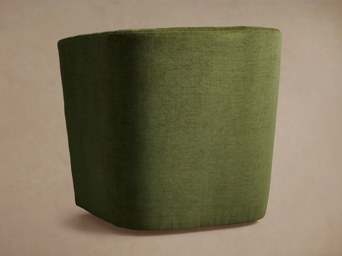 Green fabric Griffin Swivel Chair with vertically striped backrest and plush seat. Close-up shows texture and upholstery details.