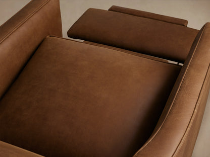 Rudy Leather Swivel Recliner in rich brown leather, features straight arms, plush seat cushion, and sleek design on wooden floor.