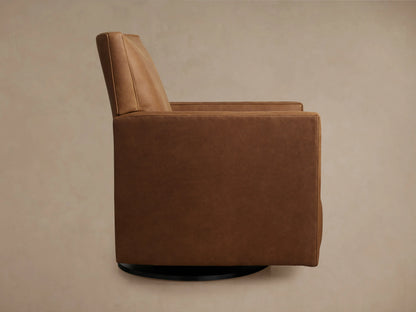 Rudy Leather Swivel Recliner in rich brown leather, top view showing seat, armrests, and extended footrest on a beige floor.