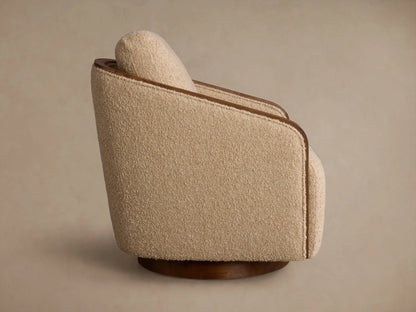 Rear view of the beige textured Pomona Swivel Chair, showing exposed oak edges and dark wood swivel base.