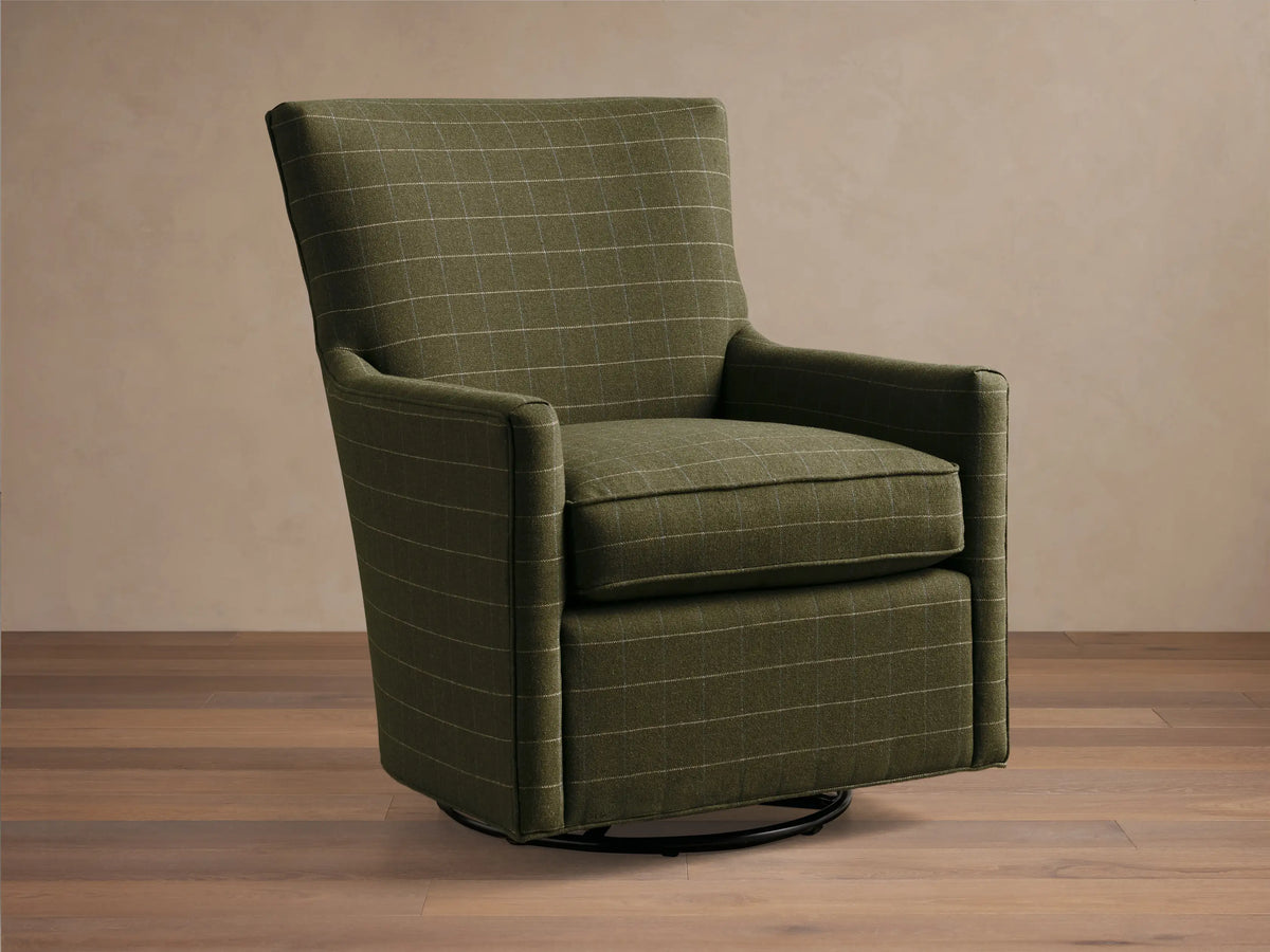 Front view of the green windowpane plaid Walton Swivel Glider with a high back and black circular base.