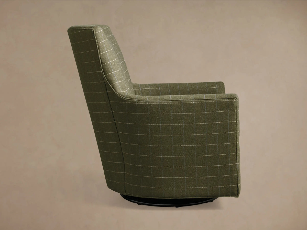 Rear view of the green windowpane plaid Walton Swivel Glider.