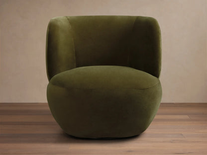 Olive green velvet upholstered chair featuring a deeply curved back and integrated armrests.
