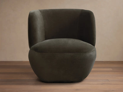 Front-side view of a dark olive green upholstered barrel chair with seamless, rounded arms and back.