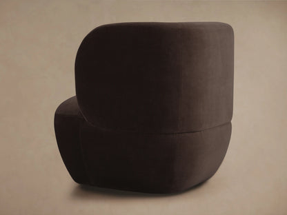 Dark brown Lenny Swivel Chair with a curved, modern design seen in side view. Features plush cushioning and smooth fabric.