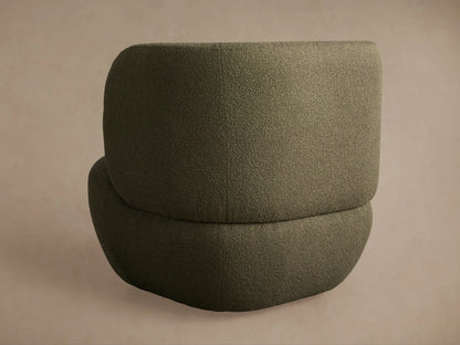Close-up of the Lenny Swivel Chair's textured olive green fabric, showing the curves of the seat and backrest.