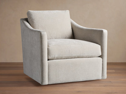 Branson Swivel Chair in beige fabric, features plush seat and back cushions, flared arms, on hardwood floor, against tan background.