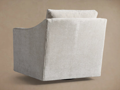 Branson Swivel Chair in side view, showcasing its neutral fabric upholstery and sleek, angular design on a tan background.