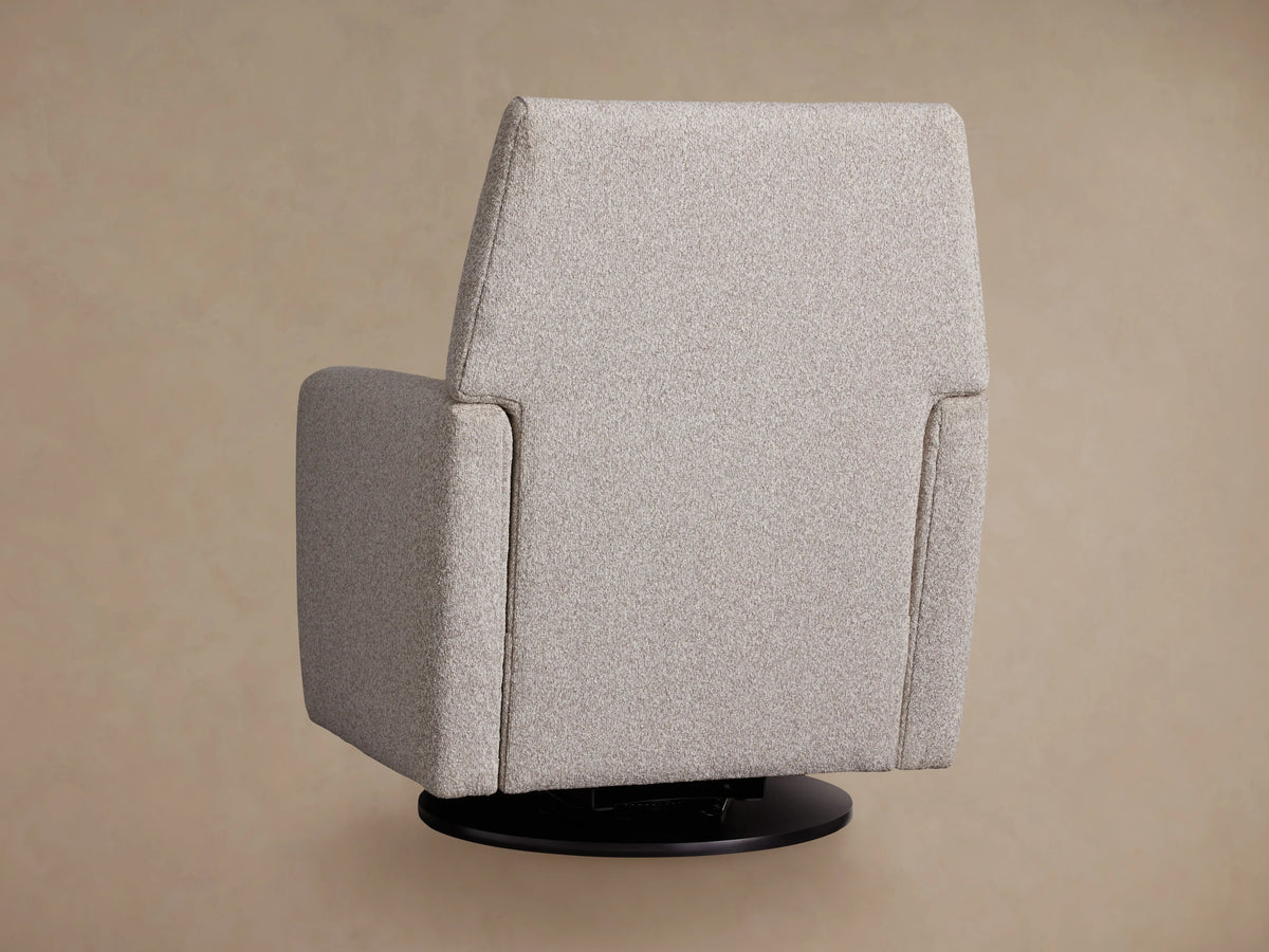 Close-up of the Harvey Swivel Recliner's seat and armrest, upholstered in light gray textured boucle fabric.