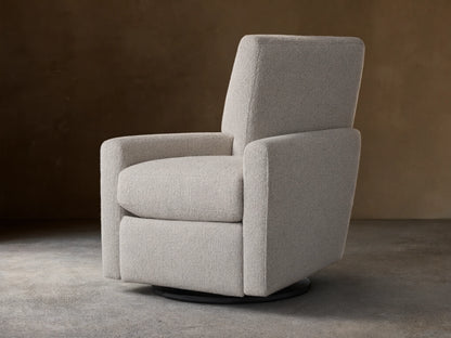 Harvey Swivel Recliner upholstered in light gray textured fabric, upright and facing forward on a wooden floor.