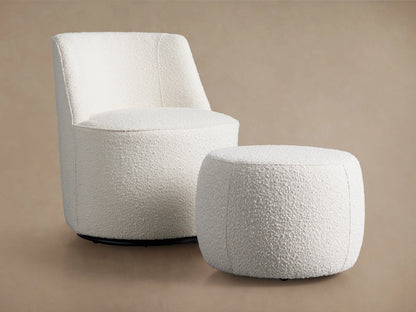 Ryles Ottoman in a textured, cream fabric with a cylindrical shape and smooth finish, against a neutral background.