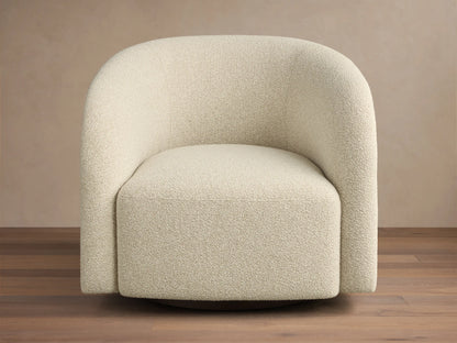 Front-side view of a cream upholstered swivel armchair with a curved back and a medium brown wood side panel.