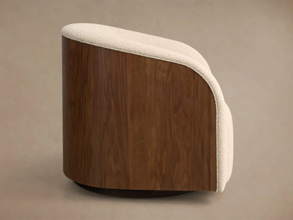 Side view of a Curved Wooden Armchair, showing its dark brown wood back, cream textured fabric top, and dark circular base.