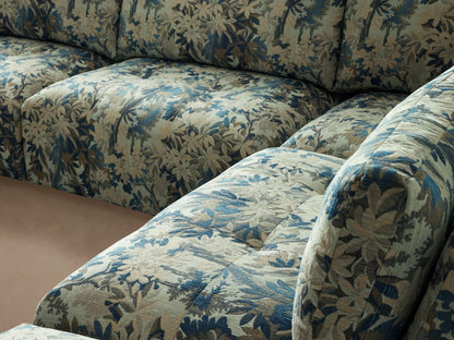 Keegan Five-Piece Sectional, L-shaped, in blue & green botanical print fabric, on a wooden floor.