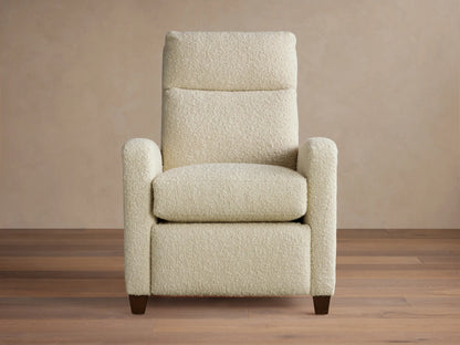 Cream Colfax Motion Recliner in textured fabric, facing forward. Dark wooden legs on a wood floor, light background wall.