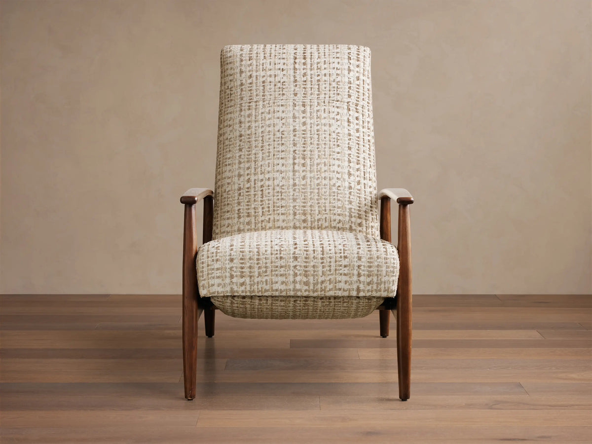 Front view of a Mid-century high-back armchair with dark brown wood frame and cream textured woven fabric upholstery.