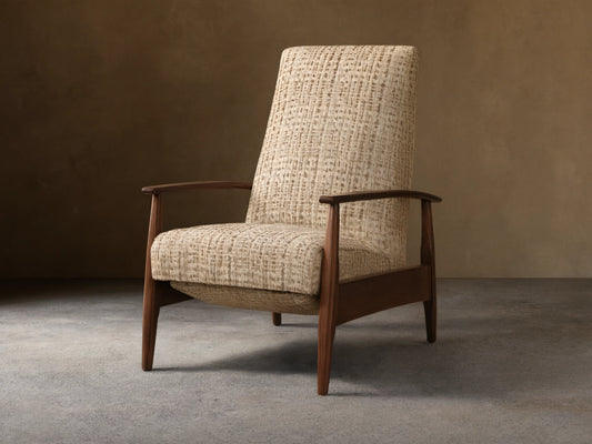 Front view of a Mid-century high-back armchair with dark brown wood frame and cream textured woven fabric upholstery.
