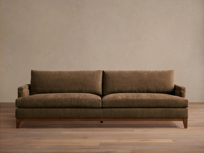 Front view of the brown textured fabric Hunter Sofa with a visible wooden base and tapered legs.