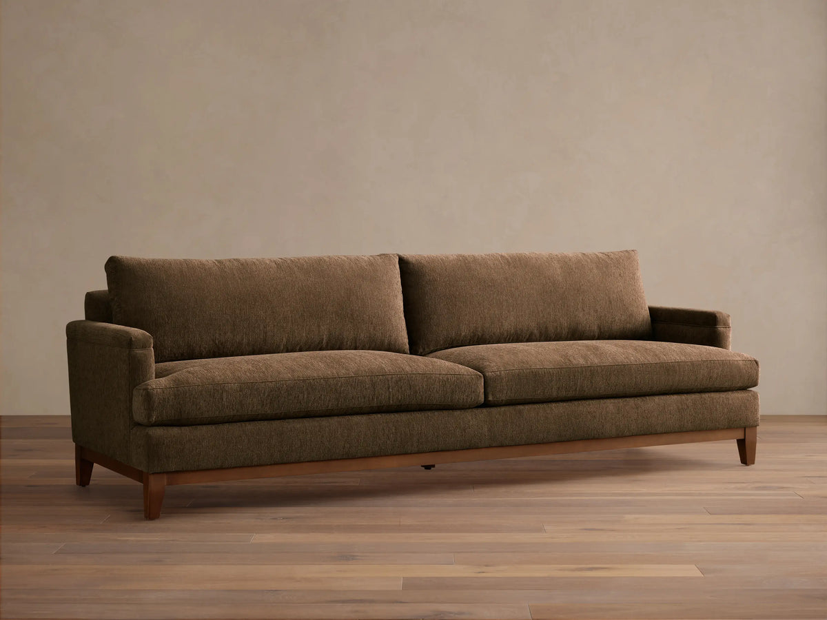 Front view of a dark brown textured fabric Hunter Sofa with two seat cushions, straight arms, and a natural wood frame and legs.