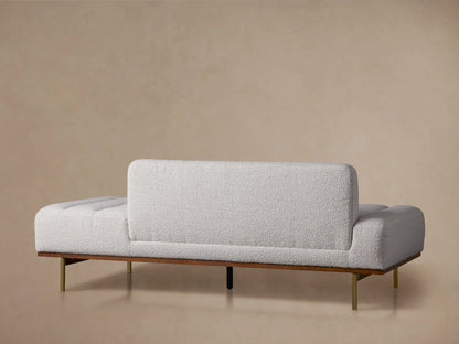 Lansing Daybed with Merino Pearl fabric features a textured surface, vertical tufting, wooden legs, and a soft cushioned back.