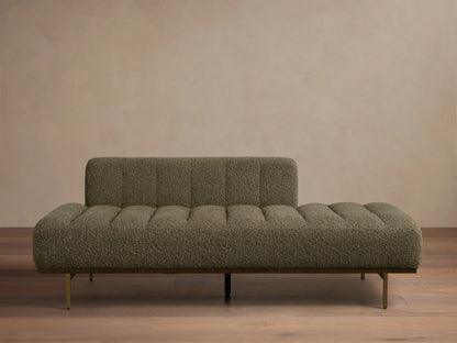 Front view of an olive green textured chaise lounge with a low back, channeled seat, and wooden base with metal legs.