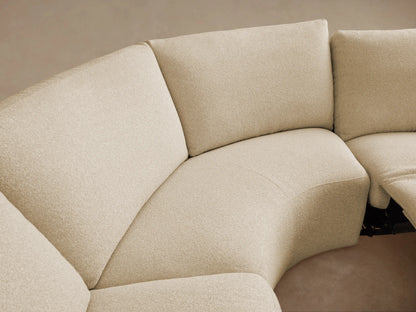 Cream Brennan Five-Piece Motion Corner Sectional with block arms and soft cushions on a wood floor against a plain wall.