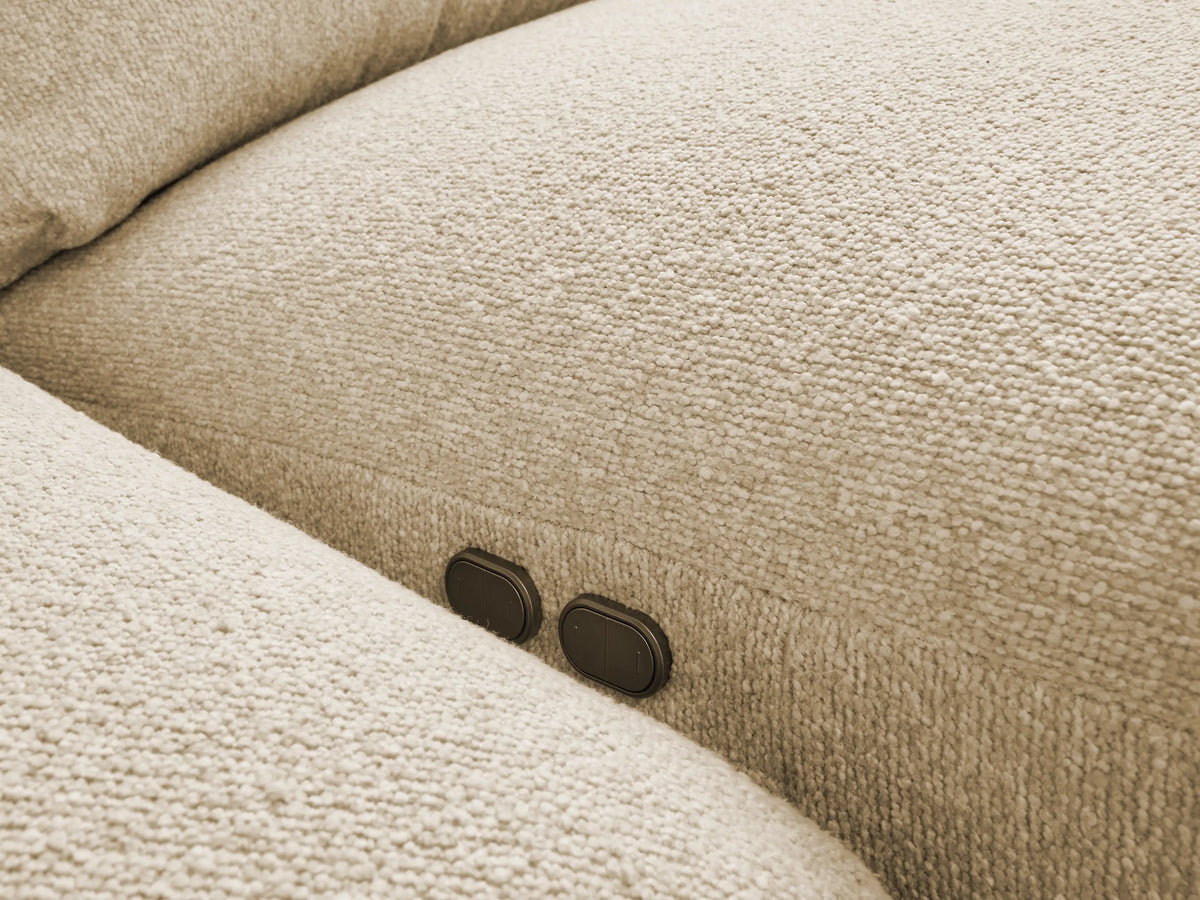 Light beige Brennan Five-Piece Motion Corner Sectional, close-up of textured fabric on curved seats and backrests.