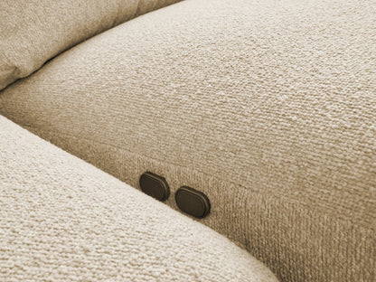 Light beige Brennan Five-Piece Motion Corner Sectional, close-up of textured fabric on curved seats and backrests.