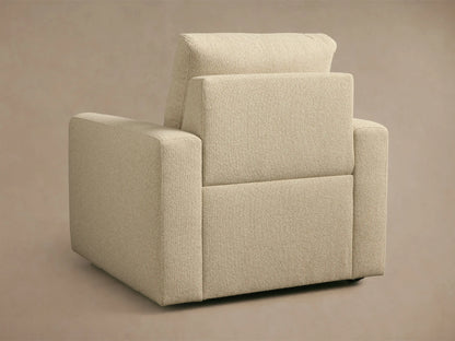 Brennan Motion Recliner in light beige textured fabric, showing a close-up of the arm, seat, and back cushion.