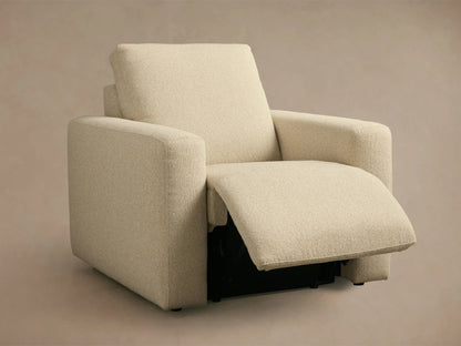 Light beige Brennan Motion Recliner, in textured fabric, seen from the back and side, featuring a modern, blocky design.