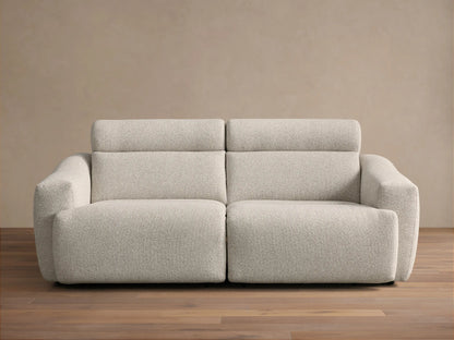 Front view of the Light beige Fia Two-Piece Motion Sofa, showing its textured bouclv© fabric and separate headrest sections.