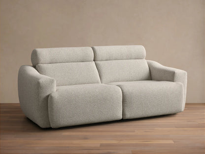 Front view of the Light beige Fia Two-Piece Motion Sofa, showing its textured bouclv© fabric and separate headrest sections.