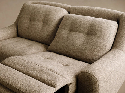 Front view of the beige textured Perry Two-Piece Motion Sofa with button-tufted back cushions and curved arms.