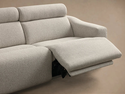 Close-up of the speckled light gray performance fabric on the Fia Three-Piece Motion Sofa with two black motion control buttons.