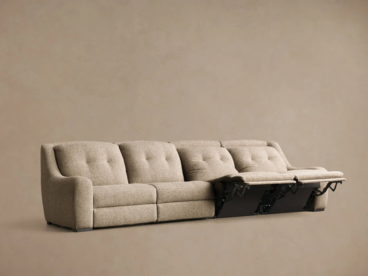 Rear view of the light brown textured Perry Four-Piece Motion Sectional™ with four back sections and a left armrest.