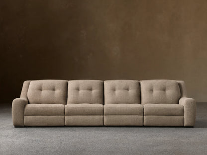 Front view of the beige tweed Perry Four-Piece Motion Sectional with four seats, tufted backs, and wide arms.