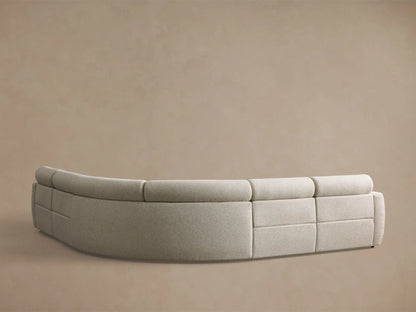 Close-up of a cream Fia Five-Piece Motion Corner Sectional, showing a textured fabric and an extended footrest.